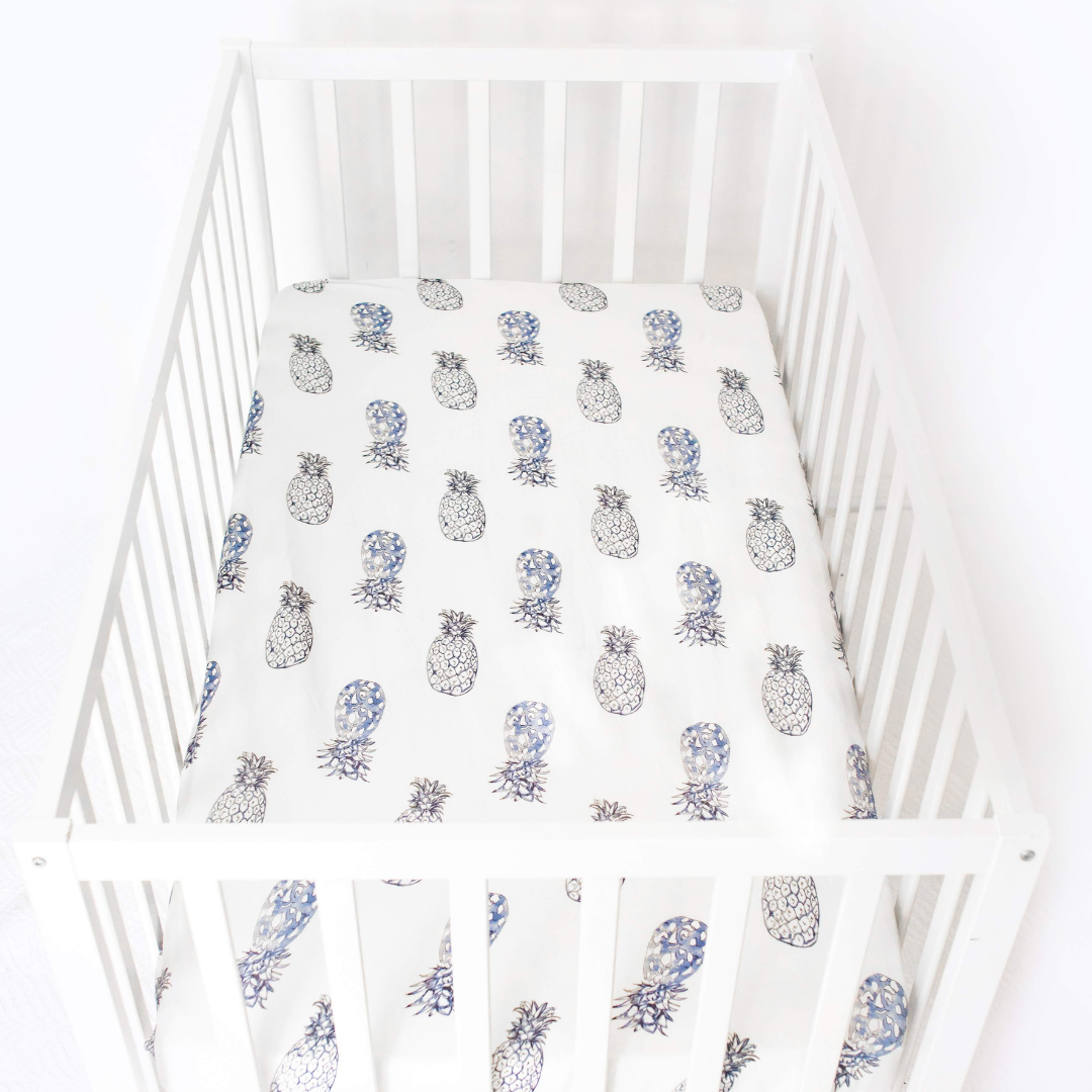 Jersey Cotton Cot Sheet - Indigo Pineapples